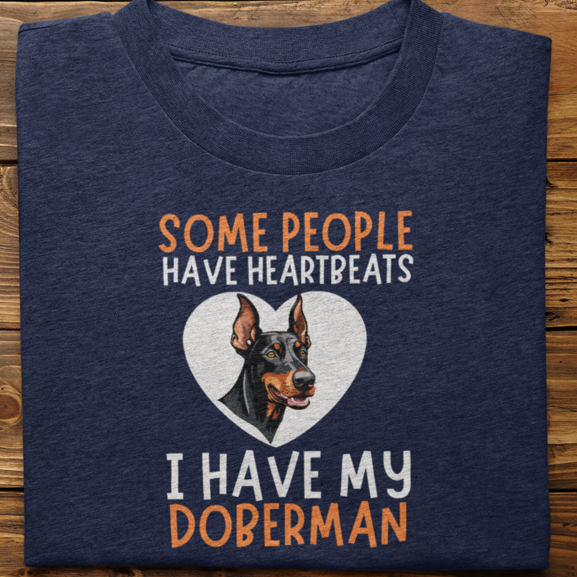 Doberman : Some Hearts Beat In Chests Tshirt Unisex