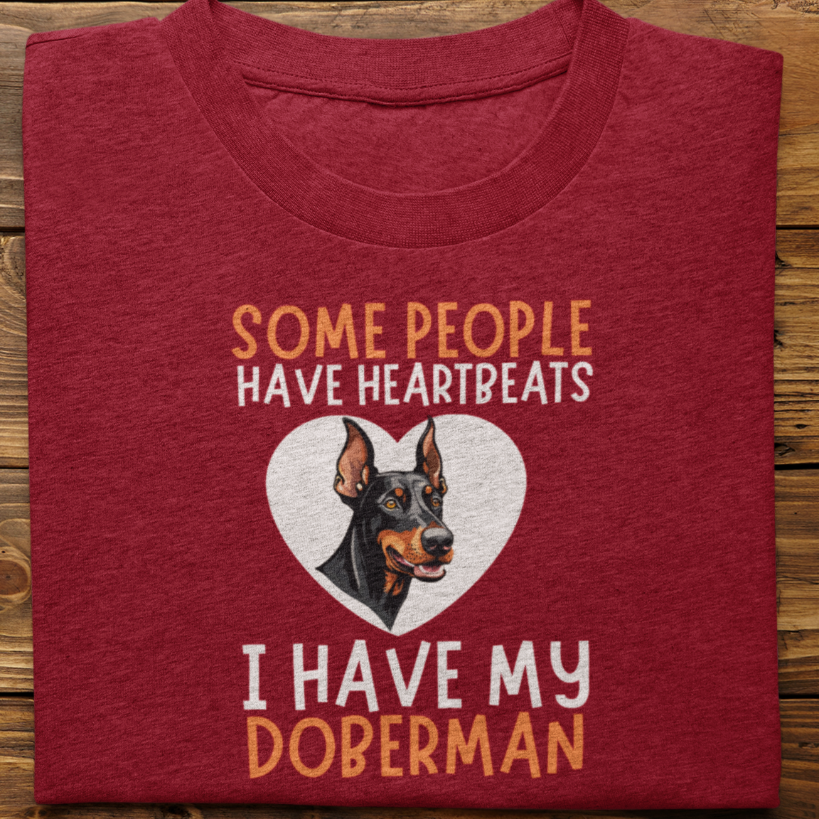 Doberman : Some Hearts Beat In Chests Tshirt Unisex